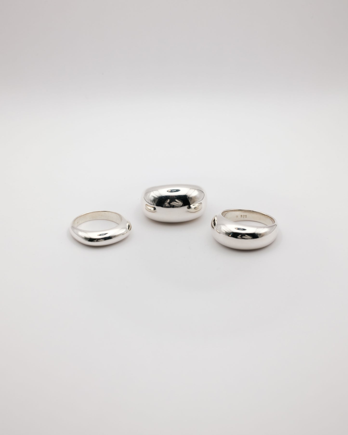 Three silver rings