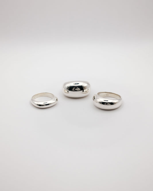 Three silver rings